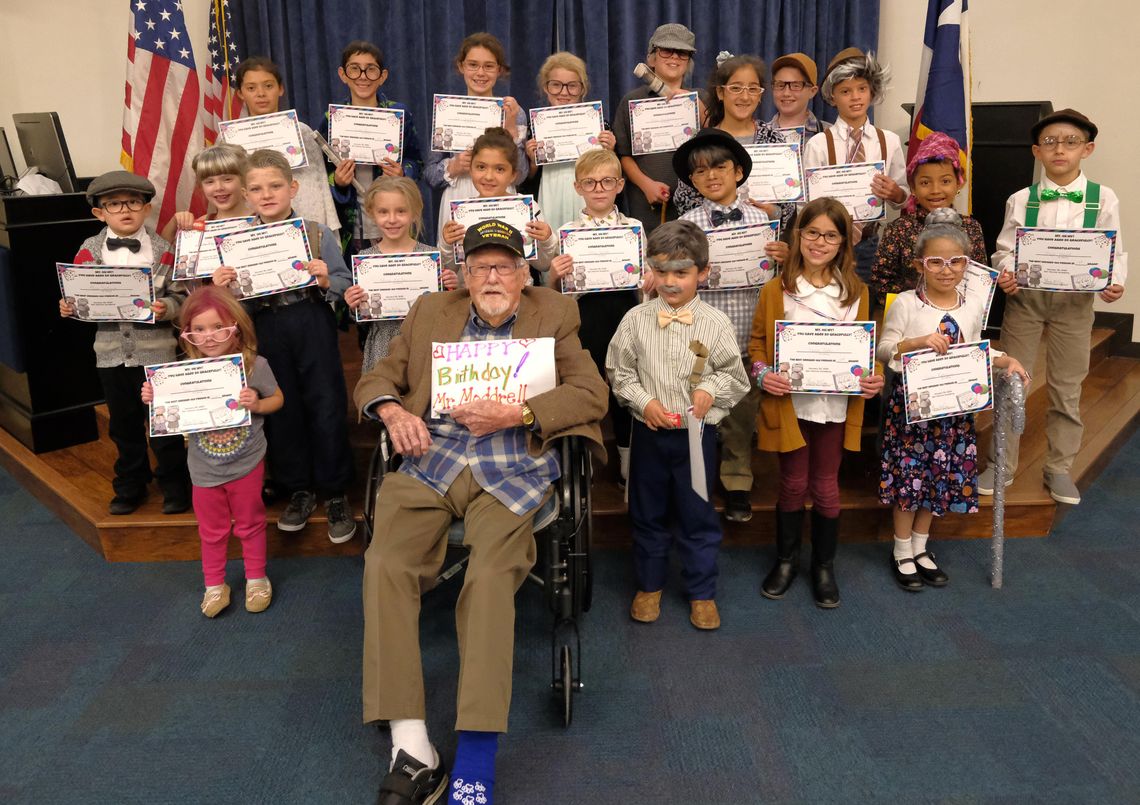 Local centenarian helps SMA celebrate 100th day of school