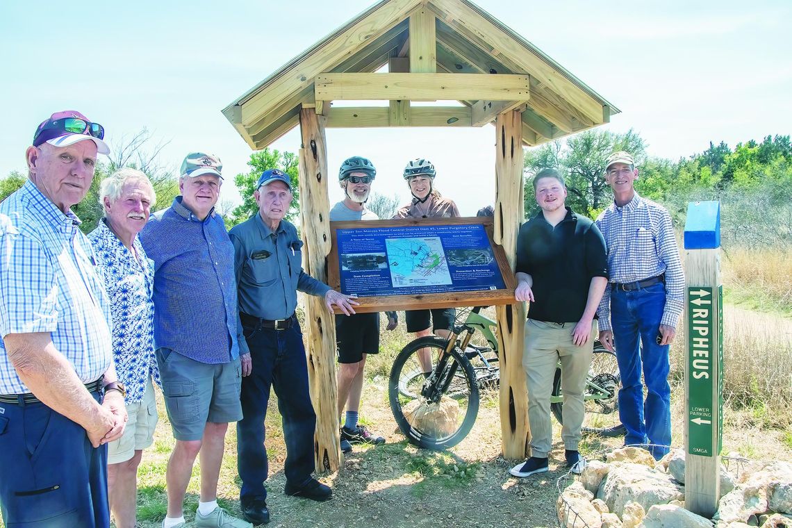 Newly installed sign in Lower Purgatory Greenspace explains flood control dam