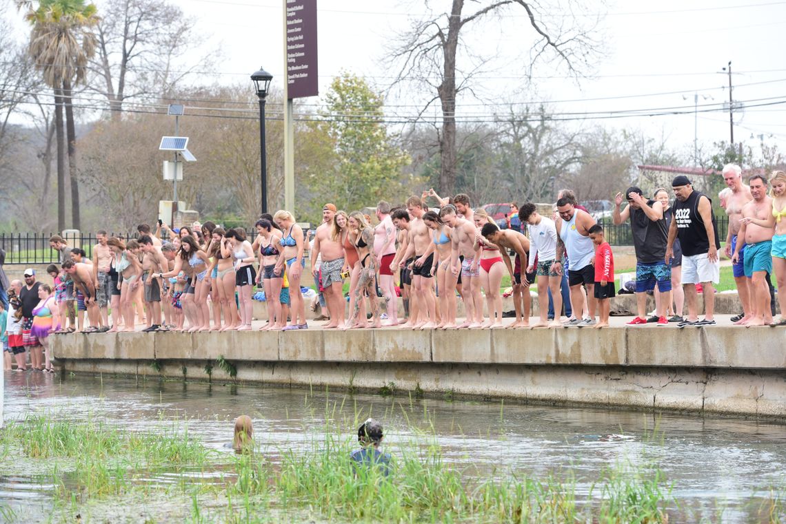 NOT-SO-POLAR PLUNGE: San Marcos residents take part in annual New Year's river splash NOT-SO-POLAR PLUNGE: San Marcos residents take part in annual New Year's river splash