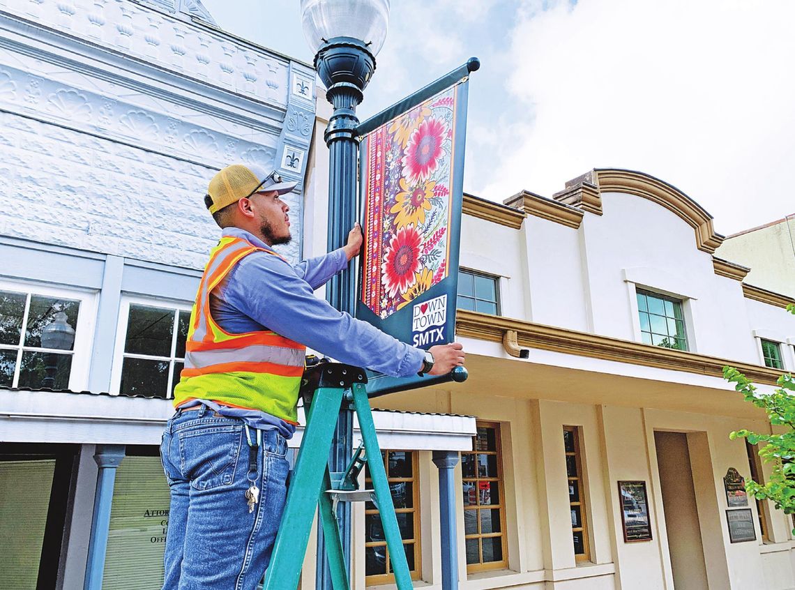 PAINTING THE TOWN: Local artist has work featured on new downtown banners PAINTING THE TOWN