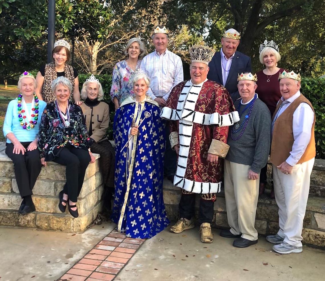 Past & present Mardi Gras royalty serve Cottage Kitchen Luncheon