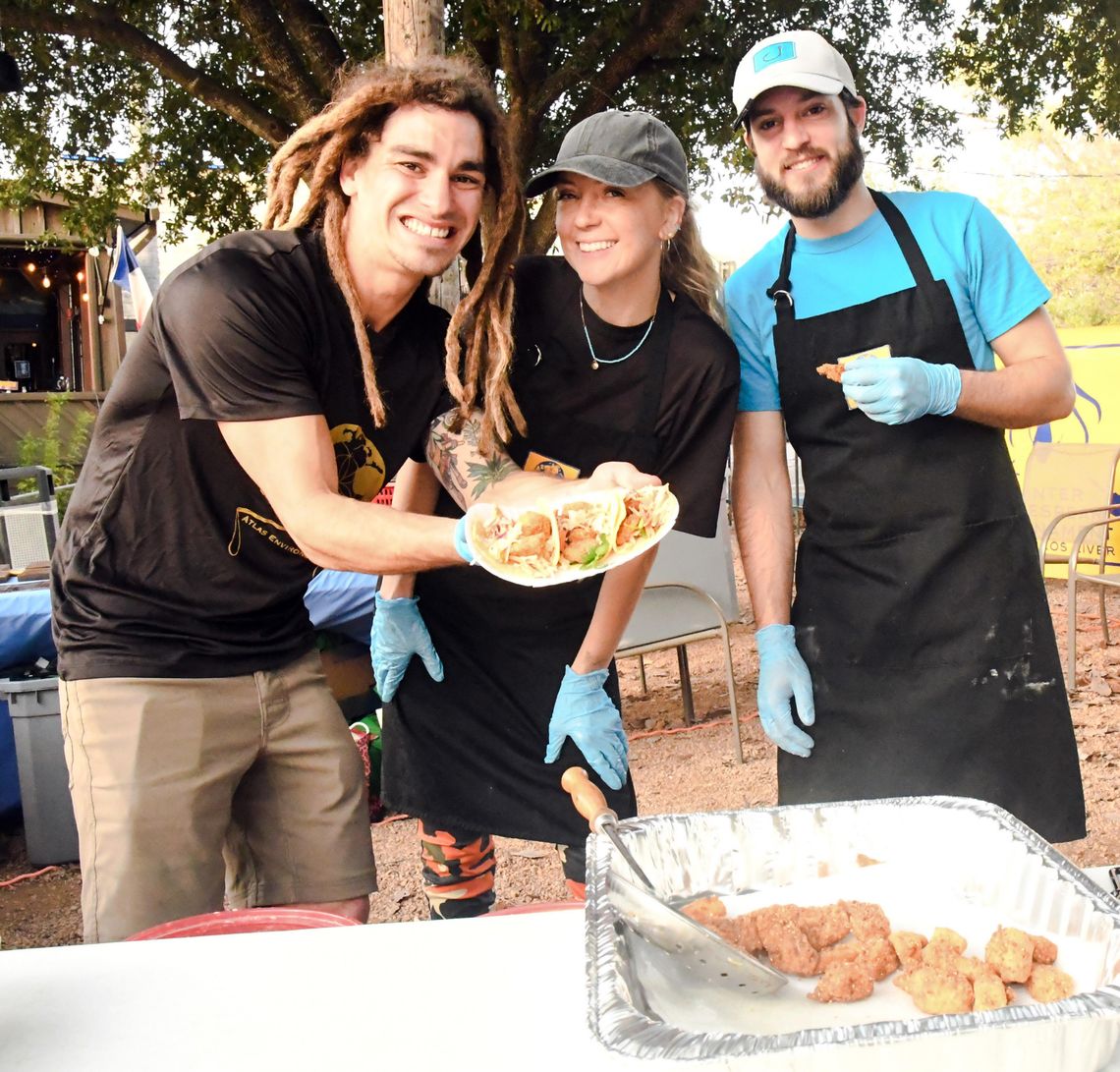 Polespear tournament removes invasive species from river, feeds community 