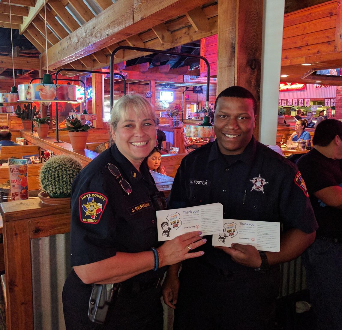 Police trade badges for serving aprons