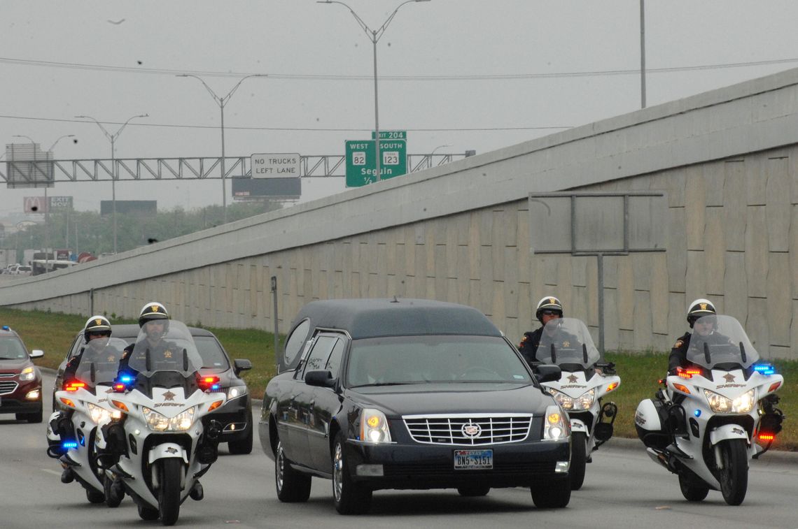 Processional for former deputy