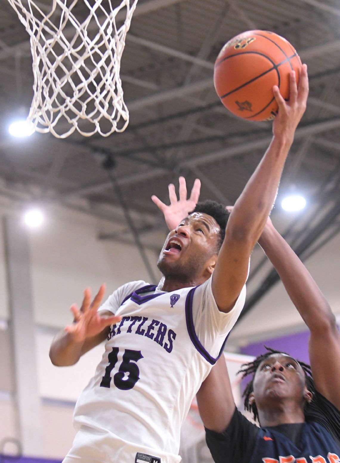 Rattlers clash with staff in annual basketball game