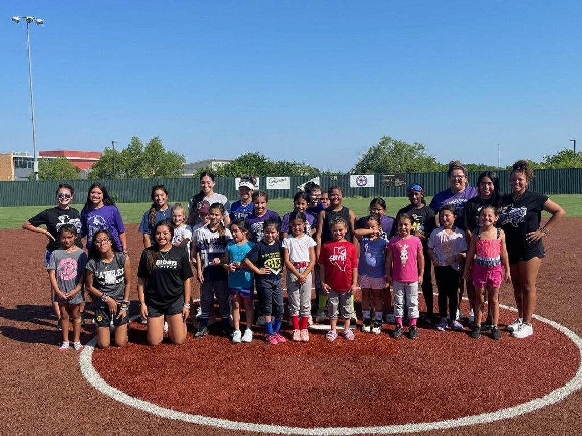 San Marcos Softball coaches up kids at summer camp