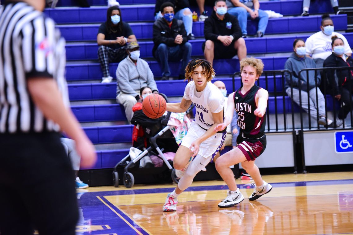 San Marcos stays focused, powers past Austin High for 76-34 victory