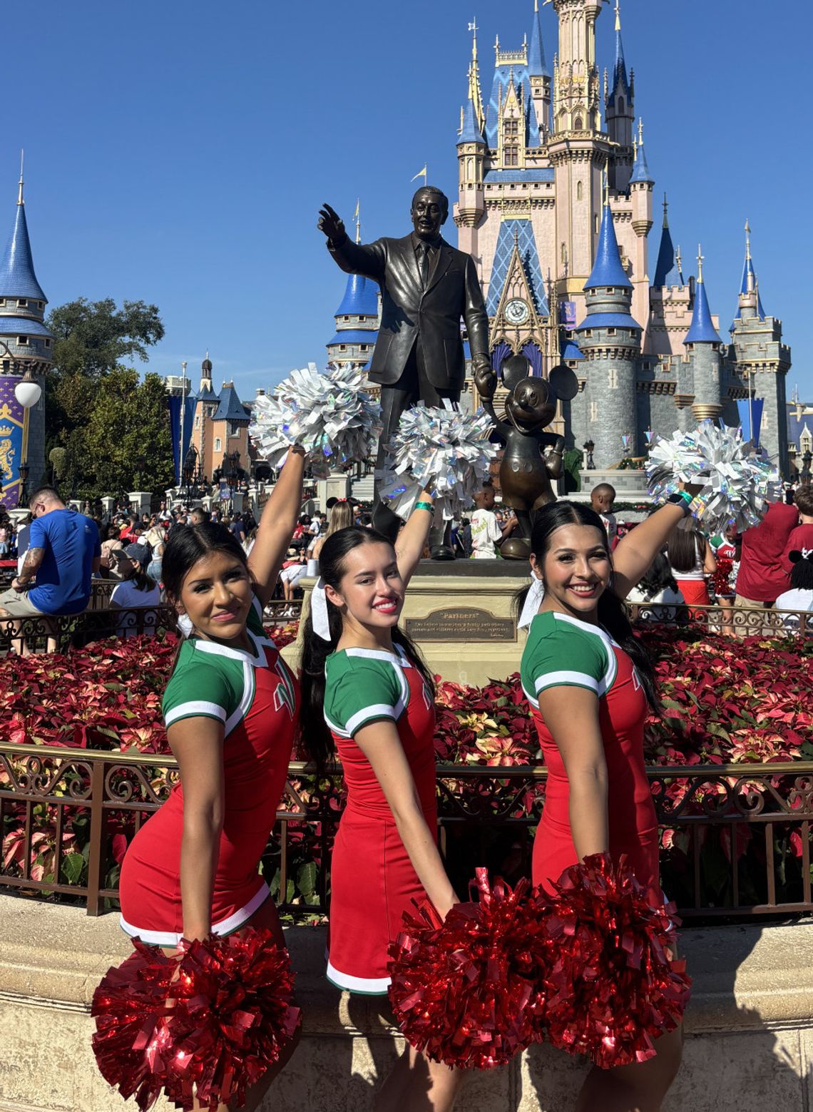 Senior cheerleading trio perform at Varsity Spirit Spectacular at Walt Disney World Senior cheerleading trio perform at Varsity Spirit Spectacular at Walt Disney World