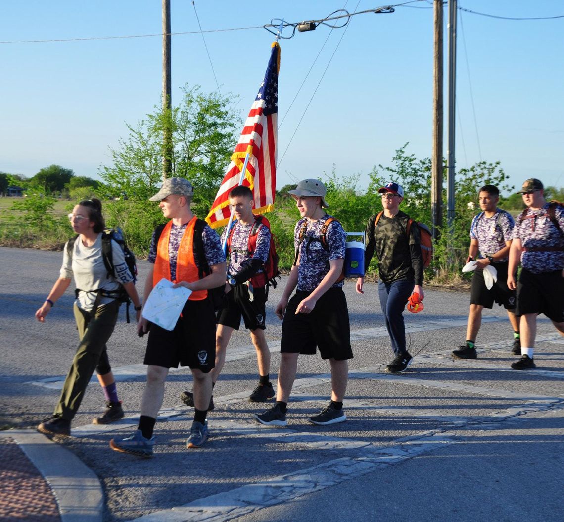 Students, veterans load up, march in footsteps of World War II heroes