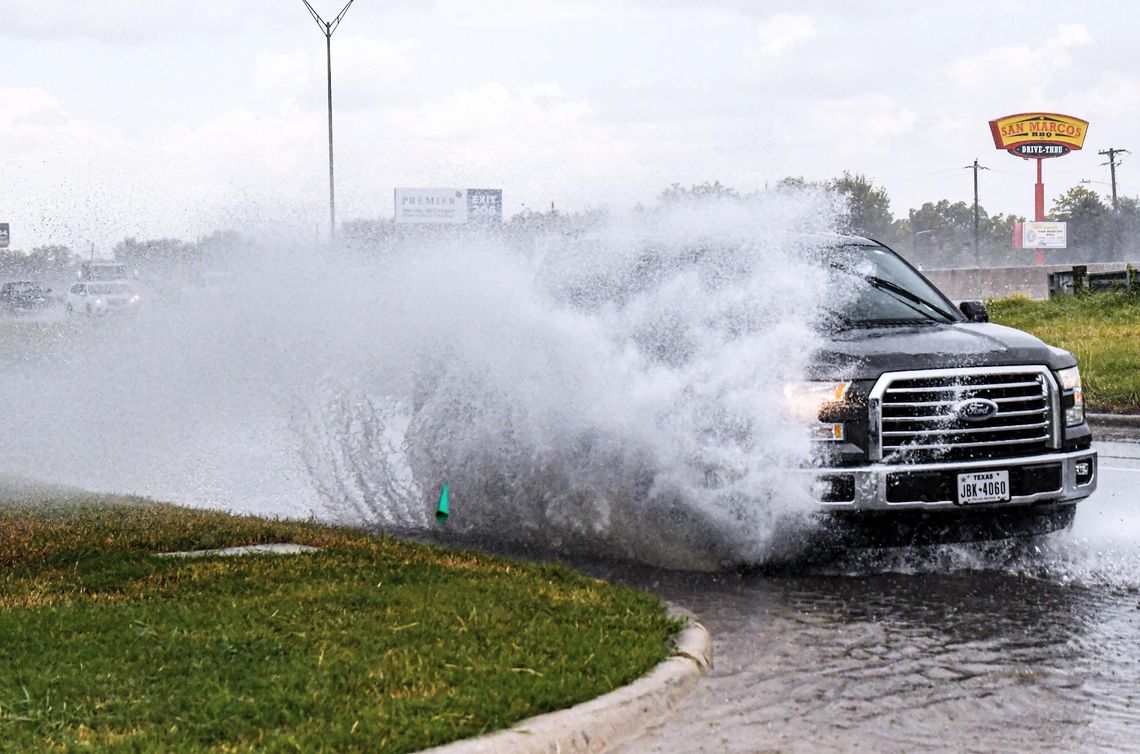 SUDDEN SPLASH: Rainstorms blow through San Marcos on Monday