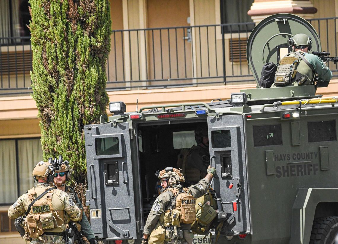 SWAT situation shuts down I-35 frontage road, suspect in custody SWAT situation shuts down I-35 frontage road, suspect in custody