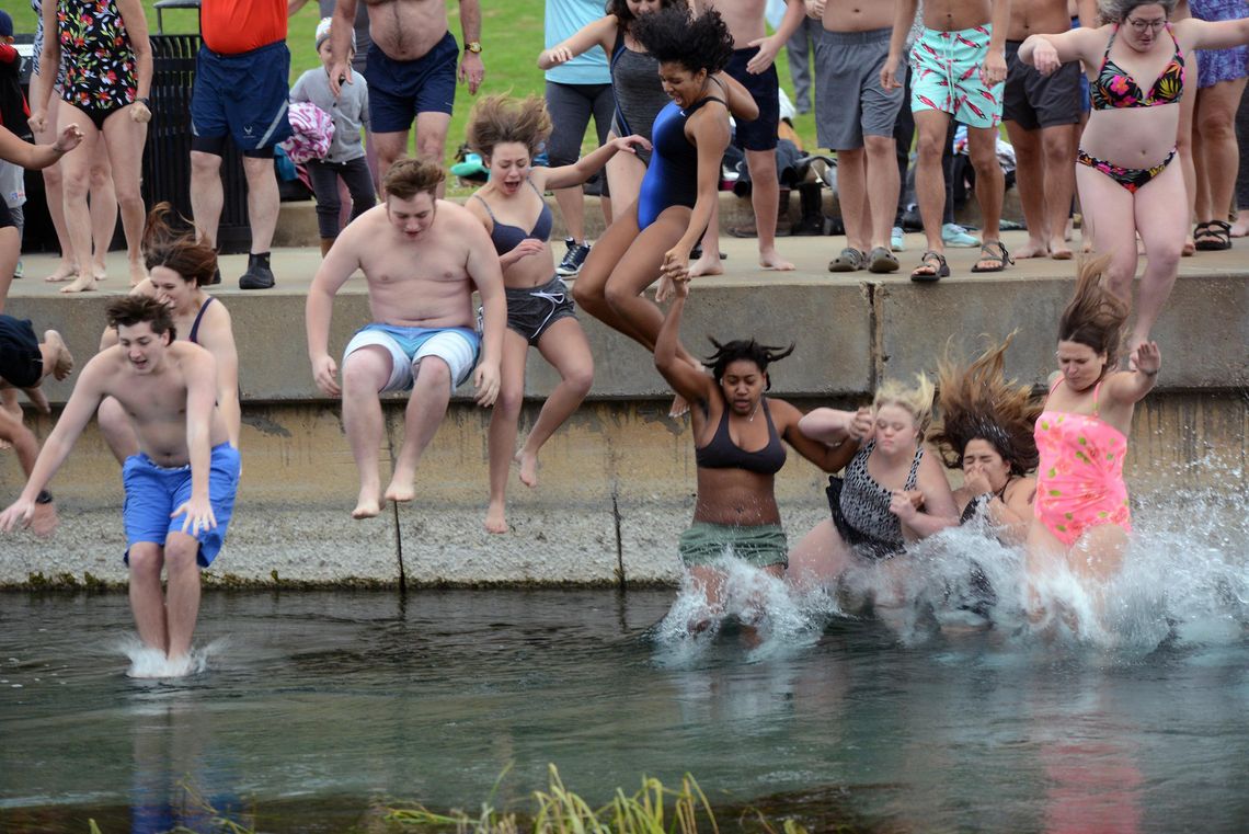 Taking the Plunge: San Marcans ring in new year in the river 