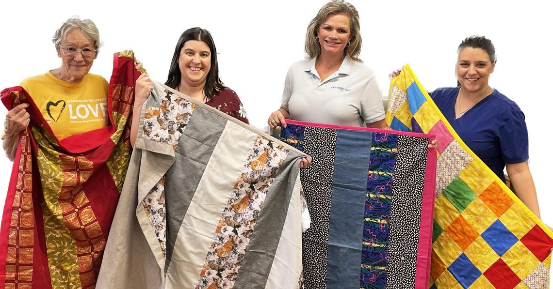 Unitarian Sewing Guild Donates Children's Quilts