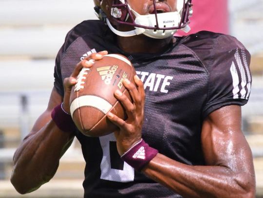 Sophmore quarterback Willie Jones III steps back to pass at Saturday's scrimmage inside  Bobcat Statium