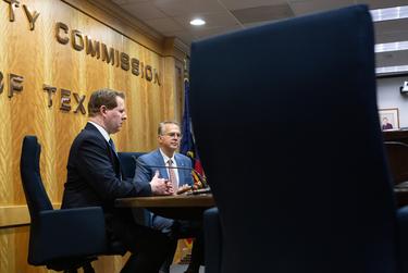From left: Public Utility Commission of Texas Chairman Peter Lake and ERCOT CEO Pablo Vegas speak at a press conference at the PUCT Headquarters in Austin on Tuesday, Nov. 29, 2022. The conference spotlighted grid reliability and readiness as Texas approaches Winter.